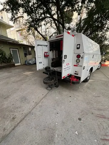 Magnet Plumbing service vehicle on-site for Slab Leak Repair in La Salle